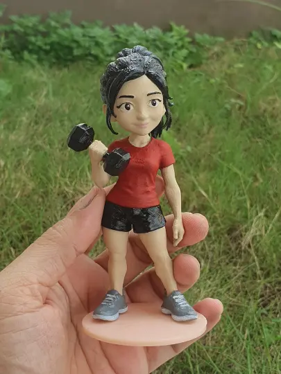 Figur wanita dengan dumbel
